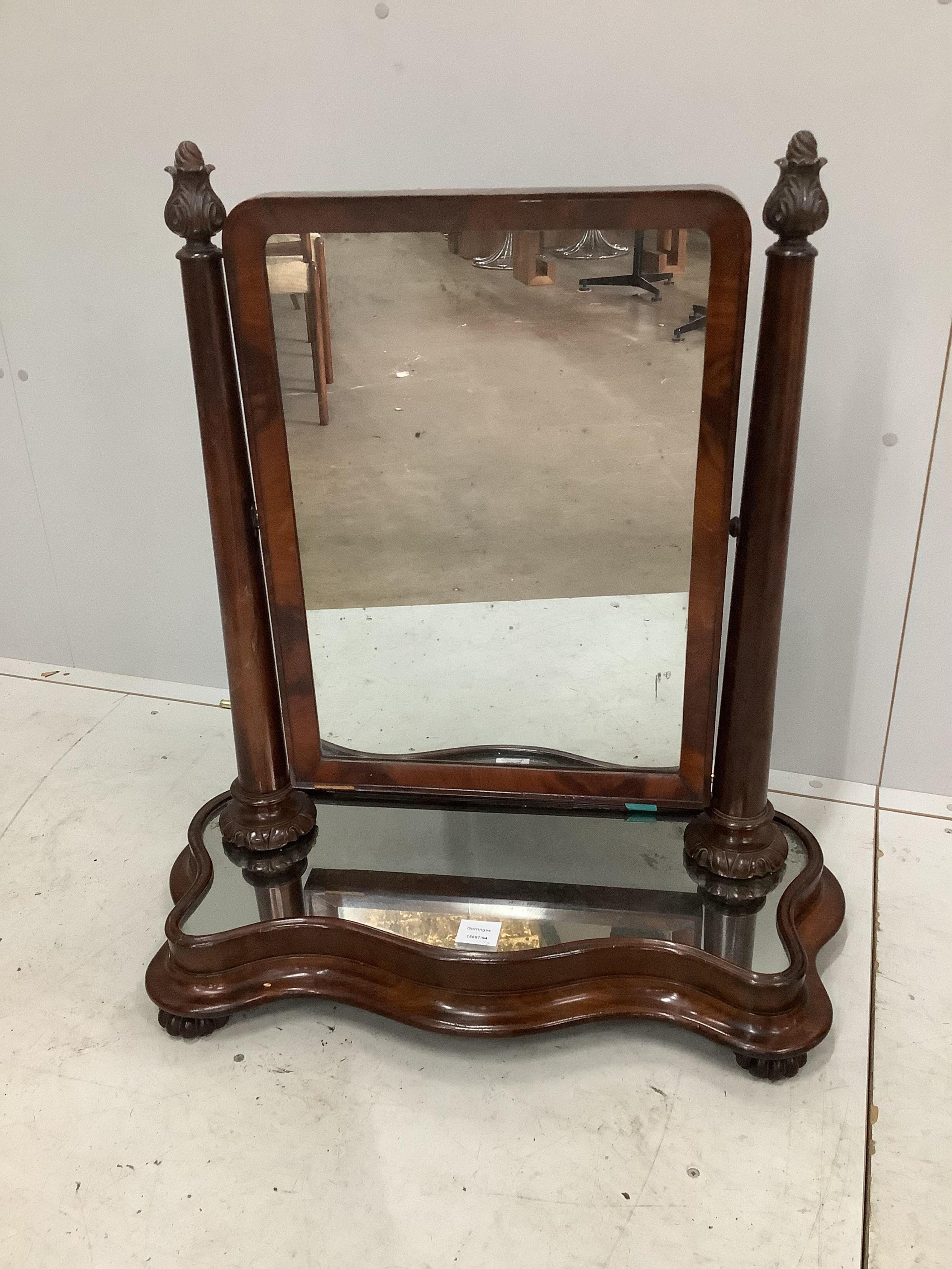 A Victorian mahogany toilet mirror, with an unusual mirrored platform base, width 72cm, depth 30cm, height 80cm. Condition - fair